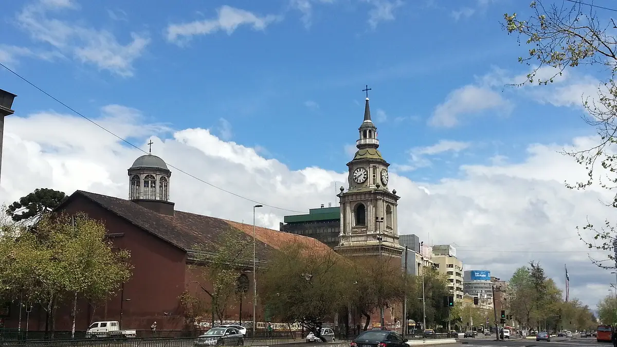 Santiago's Alameda avenue and San Francisco church after the rain