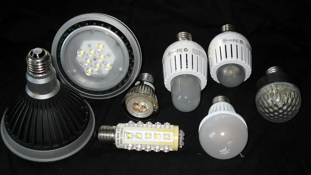Different types of LED bulbs on a black background