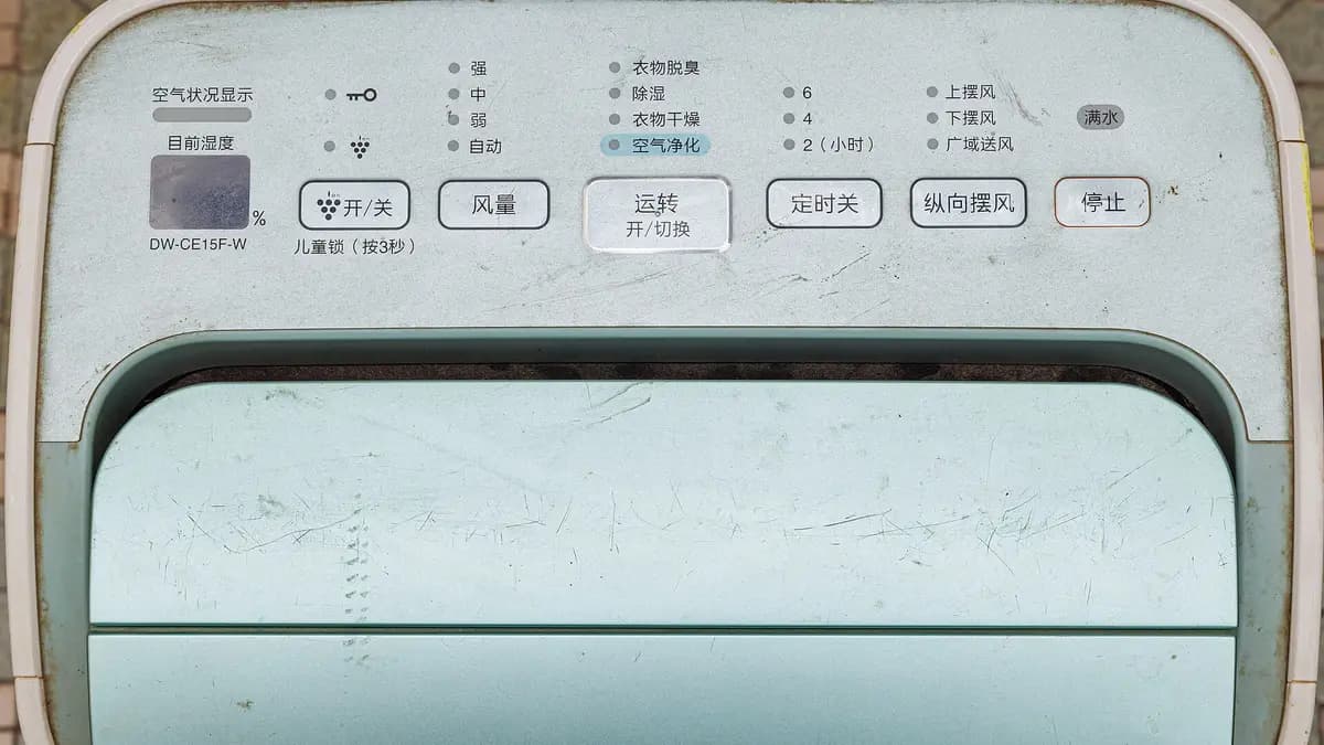 Dehumidifier control panel with humidity and timer buttons