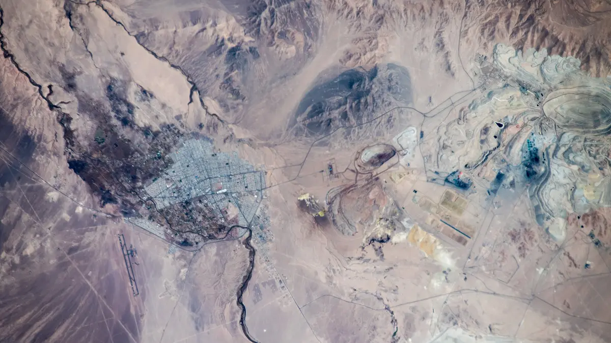 Aerial view of the Chuquicamata copper mine and the city of Calama in the Atacama Desert